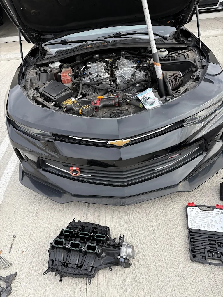 In-progress engine repair on a Chevy Camaro by AJ’s Mobile Auto Repair